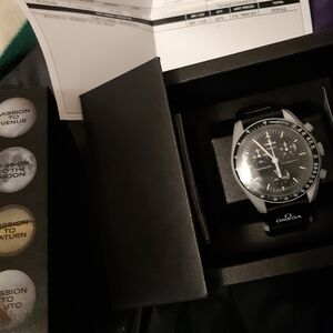 Omega Chronograph with Black and Silver Tones